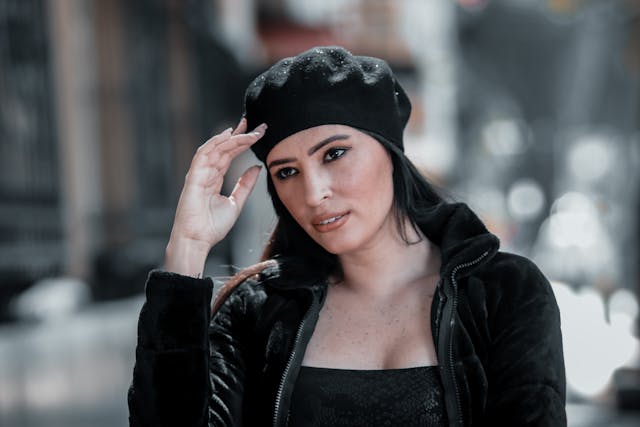 woman wearing multicolored knit hat