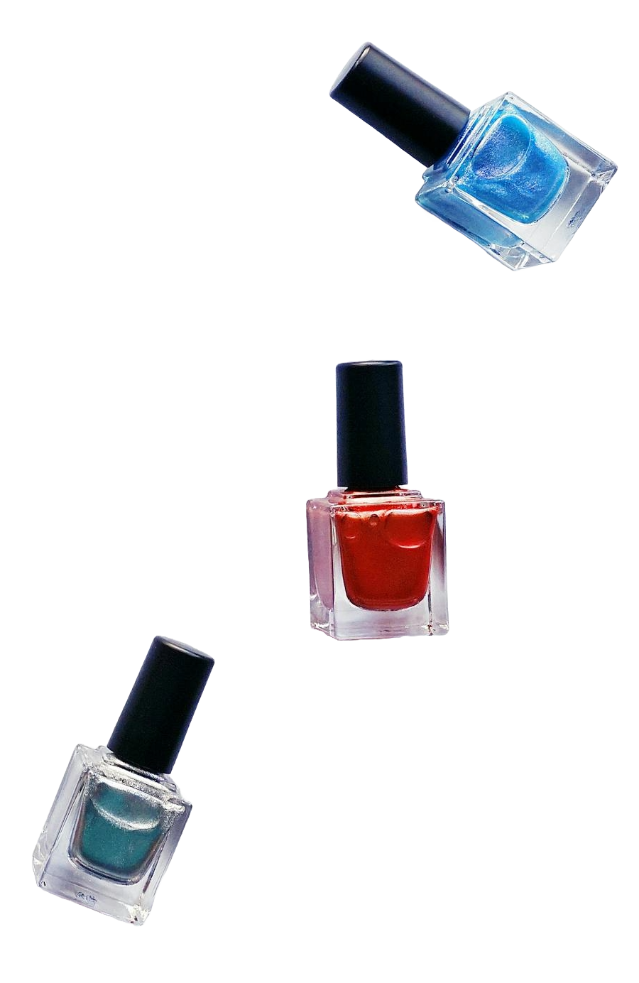 three small bottles of nail polish